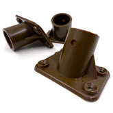 Two dark brown plastic mounting brackets or hardware components shown on a plain white background.