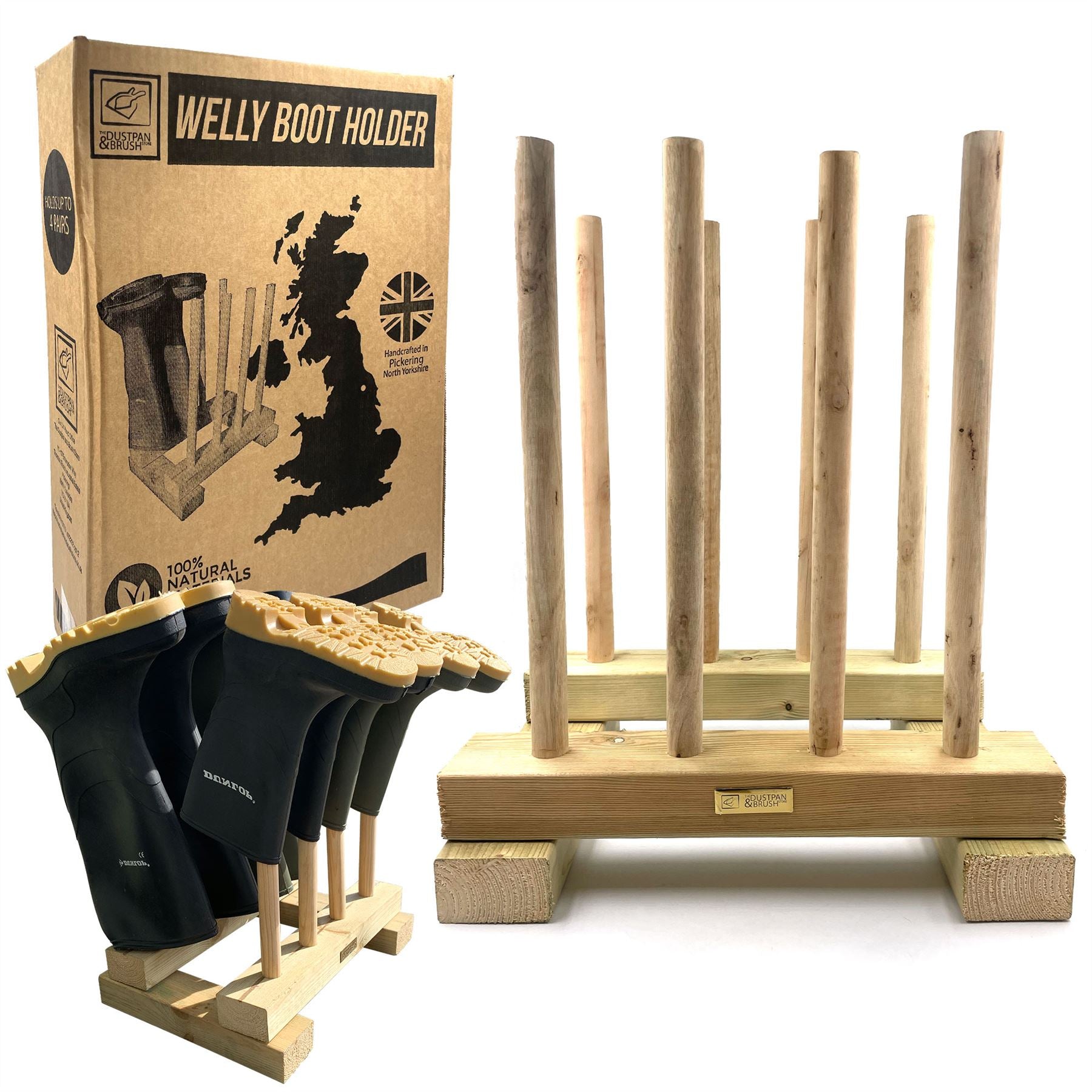 A wooden boot holder stand with six vertical pegs, shown holding several black rubber boots. The natural wood stand is displayed alongside its brown cardboard packaging box on a white background.