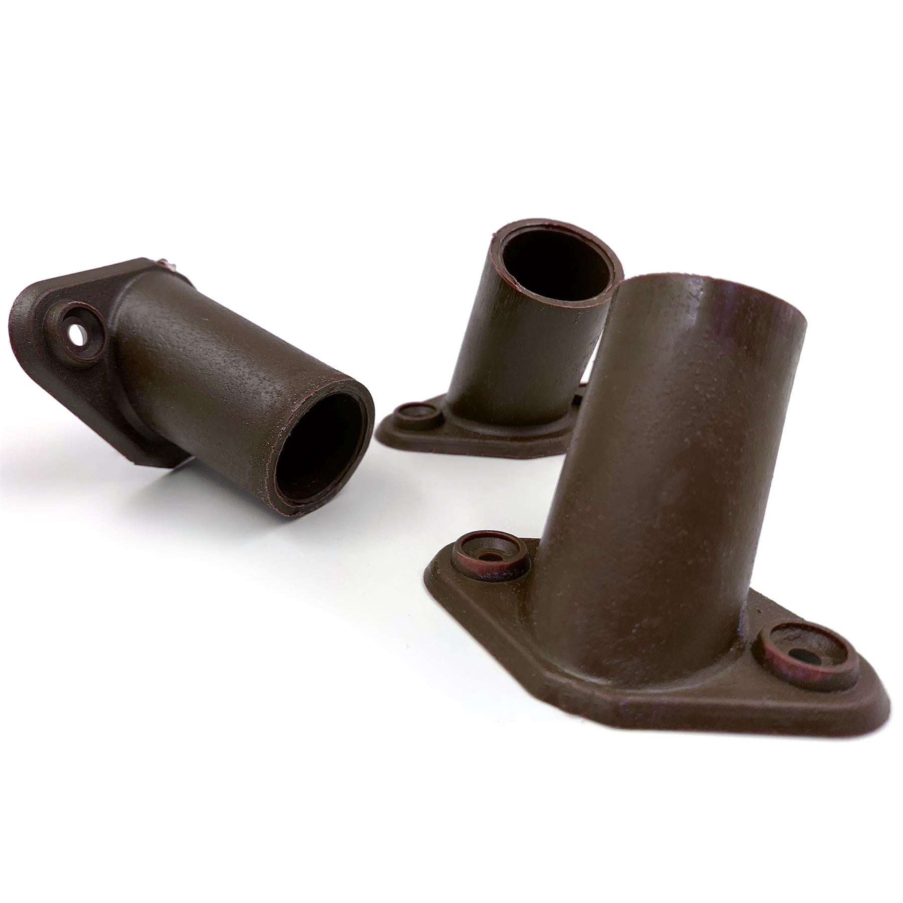 Three dark brown cast metal mounting brackets or pipe couplers shown on a plain white studio background.