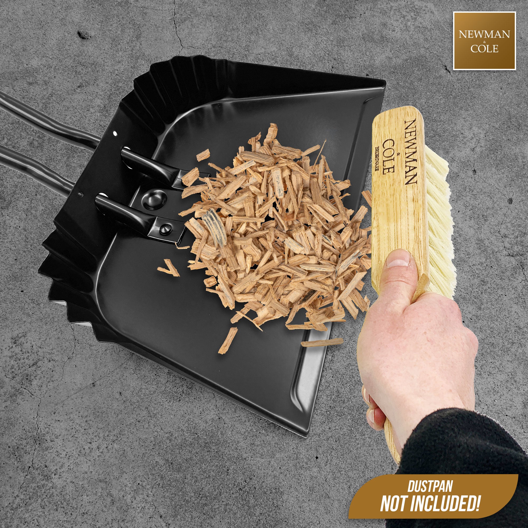 Newman and Cole Varnished Soft PVC Hand Brush sweeping up wood chips