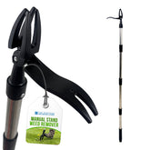 Manual stand weed remover shown in two views on a white background: one close-up of the black clamp-like hand tool attached to a silver pole, and one full-length view of the telescoping pole with black handle sections. A hanging tag reads 'Manual Stand Weed Remover' with a small brand mark that appears to say 'The Rustan' and 'Outdoor Living Store'.