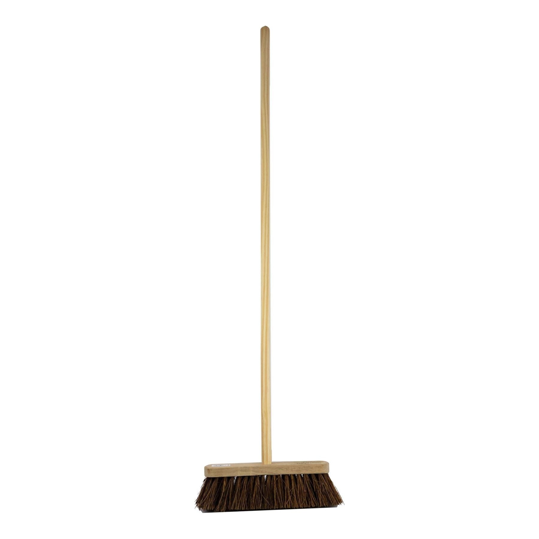 A traditional outdoor sweeping broom with a wooden handle and natural stiff bassine bristles, assembled together.