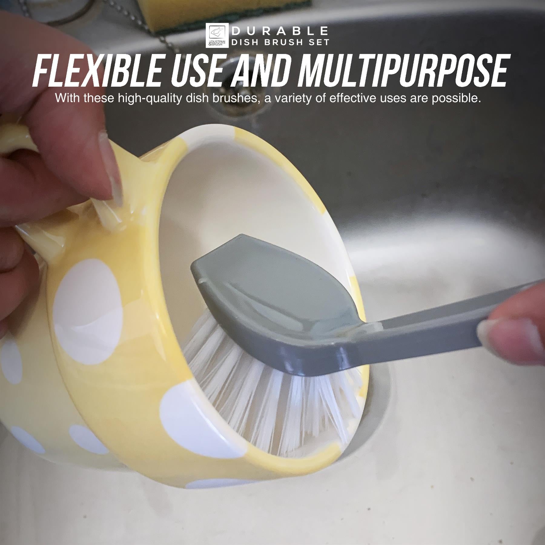 A close-up of a hand holding a yellow and white polka dot mug while using a flexible grey dish brush inside the mug, with a stainless steel sink in the background. Text at the top reads 'DURABLE DISH BRUSH SET' and 'FLEXIBLE USE AND MULTIPURPOSE'.