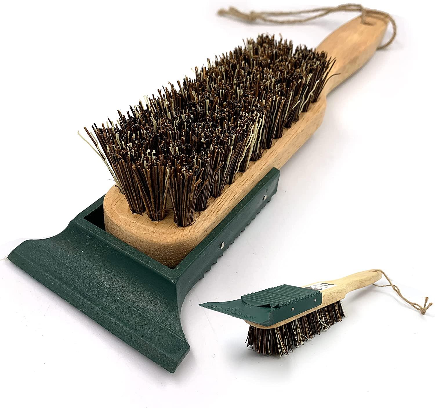 Set of cleaning brushes with wooden handle and bristle head on a white background