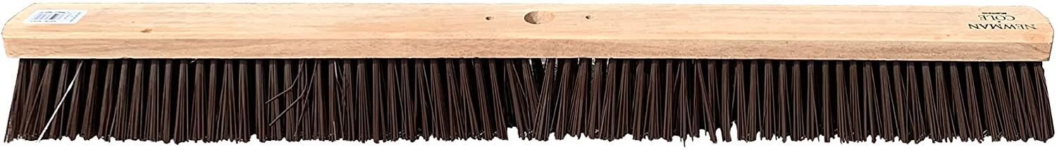 Long-handled brush with wooden handle and bristles on a white background