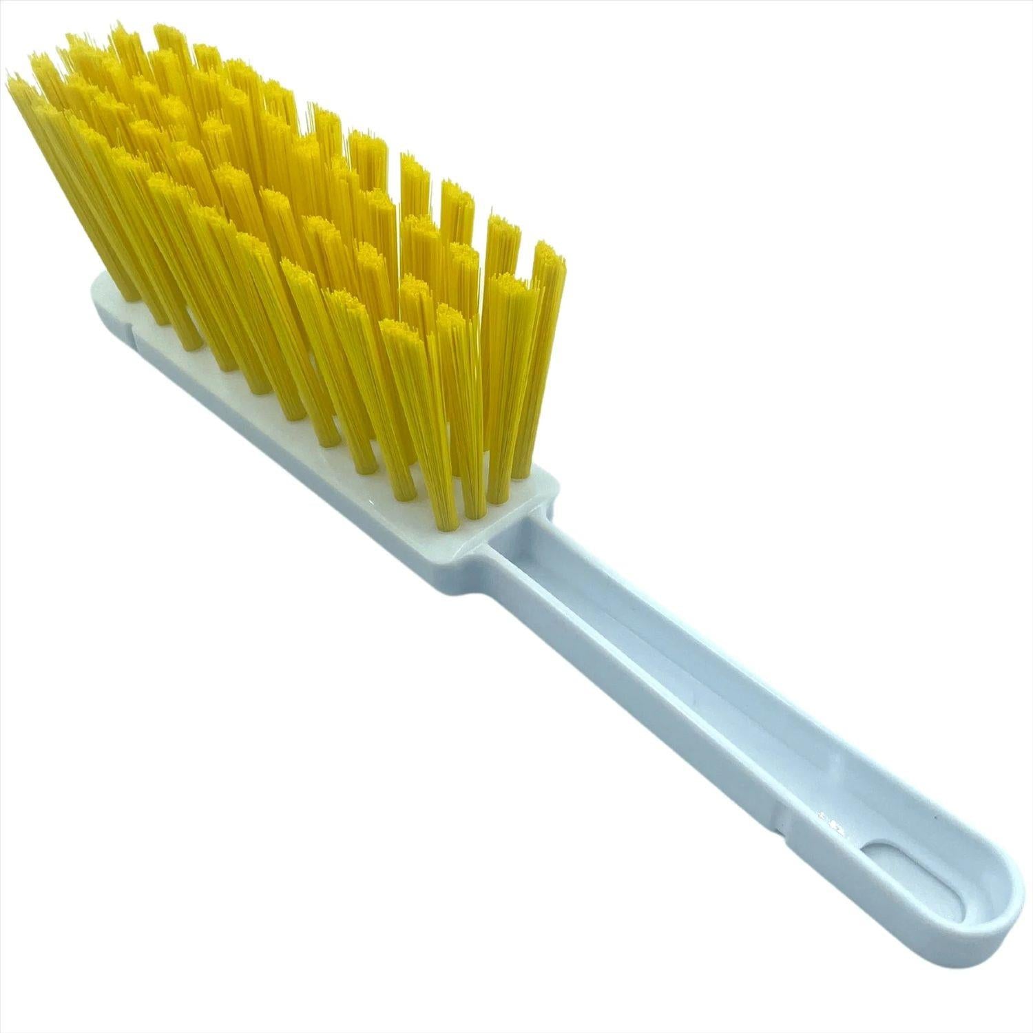 A plastic cleaning brush with bright yellow bristles and a light blue handle, shown on a plain white background.