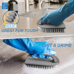 Cleaning brush with blue gloves scrubbing a sink, with text about its effectiveness on tough stains.