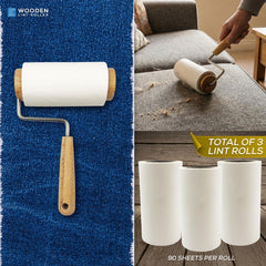 A wooden lint roller shown on a blue carpet, with a hand using it on a gray sofa. Three white lint rolls are pictured at the bottom, with text reading 'TOTAL OF 3 LINT ROLLS' and '90 SHEETS PER ROLL'.