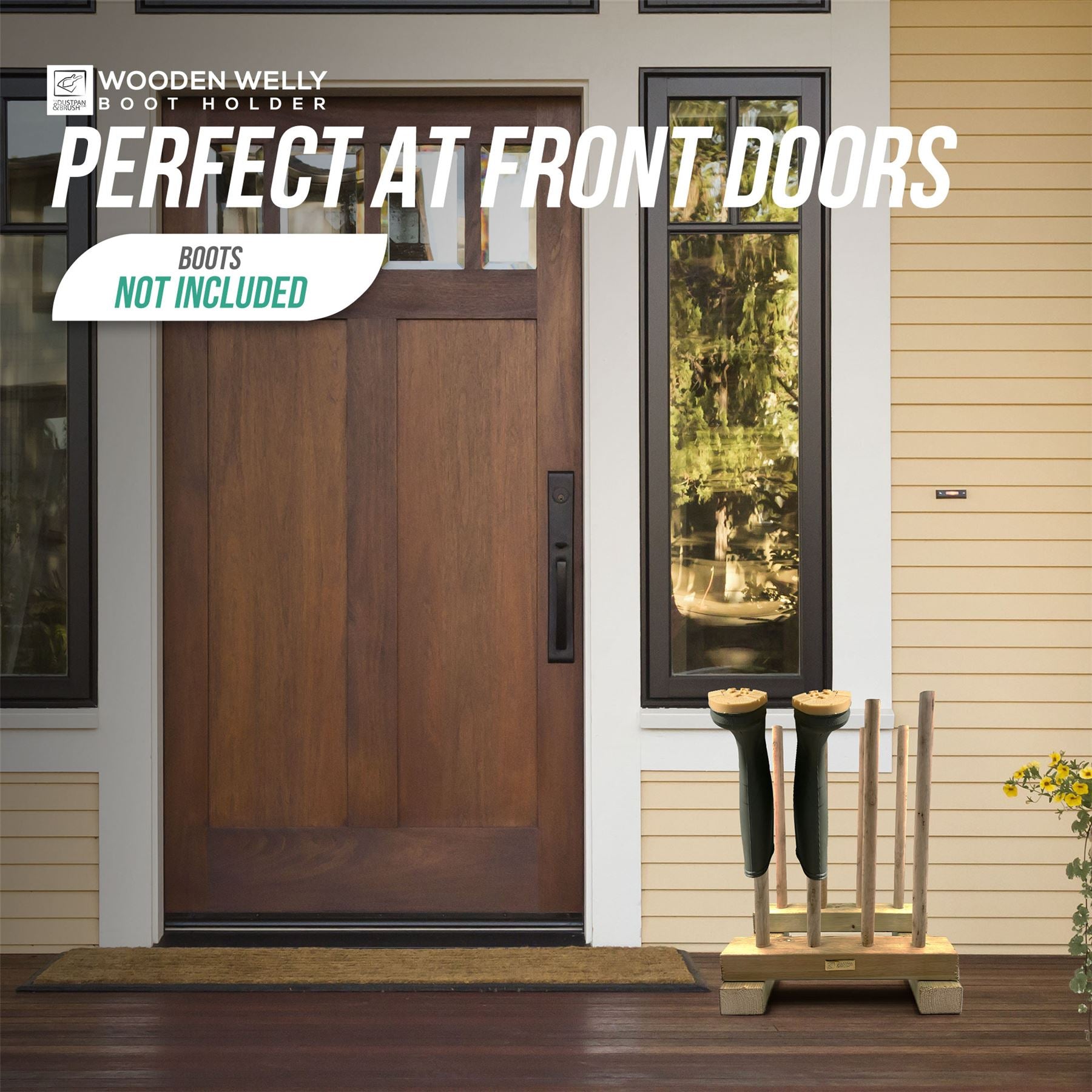 Wooden entryway scene showing a brown front door with large white text reading 'PERFECT AT FRONT DOORS' and a badge that says 'BOOTS NOT INCLUDED.' A wooden boot holder with several tall boots is placed on the porch beside the door, and the house exterior with beige siding is visible.