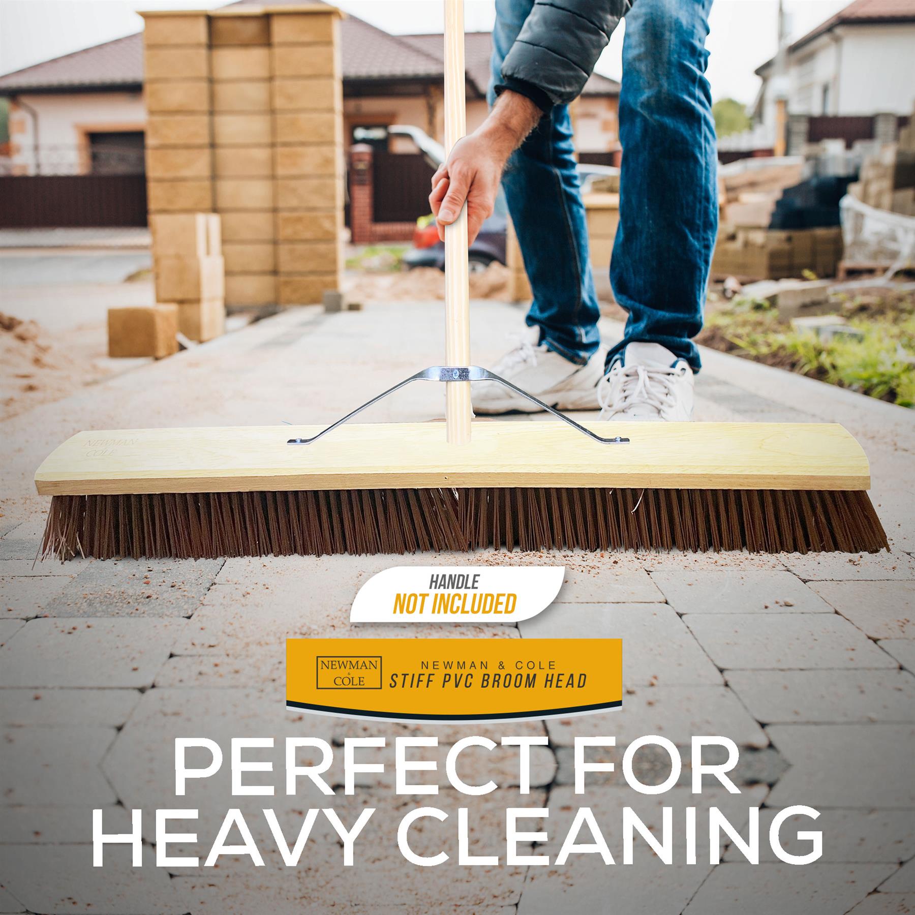 Person using a broom on a patio with text about a broom head and handle not included.