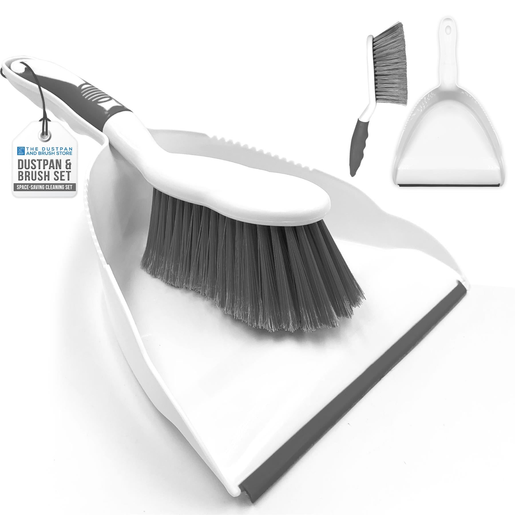 White dustpan and brush set with gray bristles on a white background