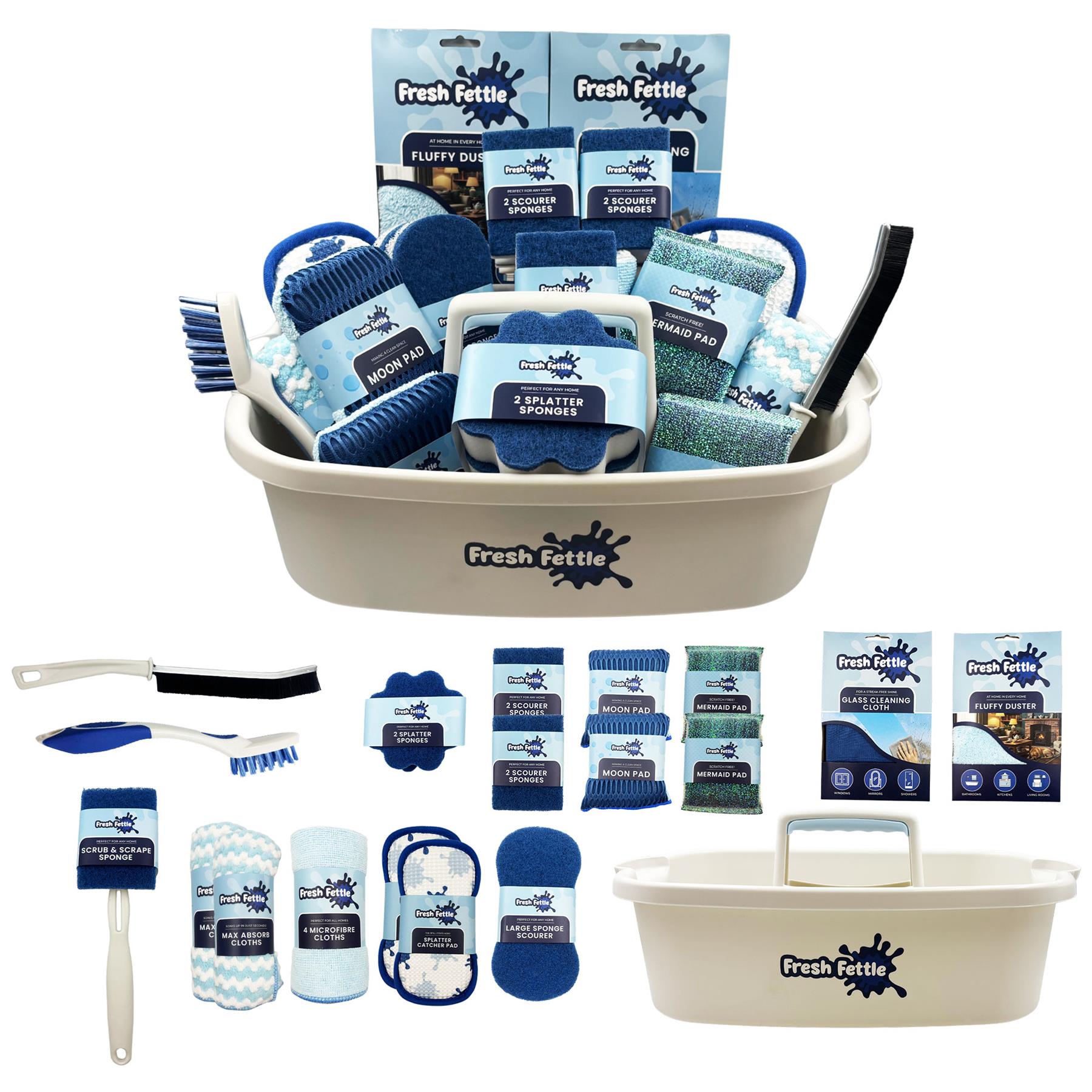 A Fresh Cattle branded cattle grooming kit displayed in a beige plastic tub, with additional grooming accessories arranged around it on a white background. The set includes blue and white brushes, a spray sponge, cloths, and packaged grooming items.