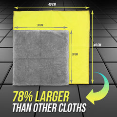 Gray and yellow cloths with measurements on a tiled floor background