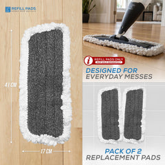 A pack of two grey and white microfibre mop refill pads shown on a wood floor with a mop attachment, plus printed dimensions (41 cm by 17 cm) and text noting they are designed for everyday messes and sold as a pack of 2 replacement pads.